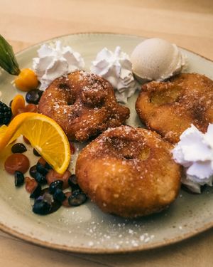 Apple fritters for dessert. at Max Pett in Munich