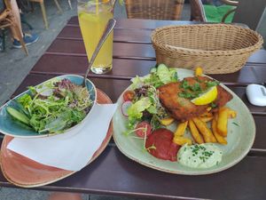 Snitzel with fries, side salad at Max Pett in Munich
