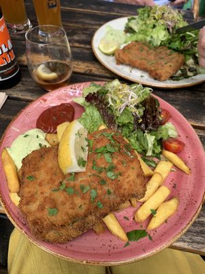 Schnitzel with pommes. Back plate with potato salad.  at Max Pett in Munich