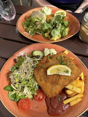Schnitzels with chips and potato saladd  at Max Pett in Munich