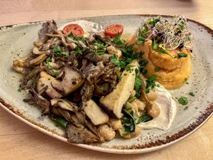 Grilled king oyster mushrooms on cashew tahini cream with sautéed dandelion, white beans and sweet potato puree 😍  at Max Pett in Munich