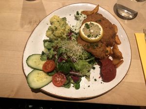 Vegan schnitzel, potato salad, wedges and homemade ketchup at Max Pett in Munich