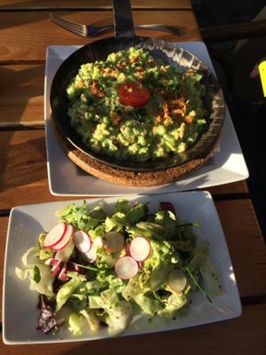Vegan Käsespätzle with salad. at Max Pett in Munich