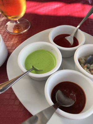 Different dipping for the papadums. The mint dip was so good!  at Taj Mahal Tandoori in Almunecar
