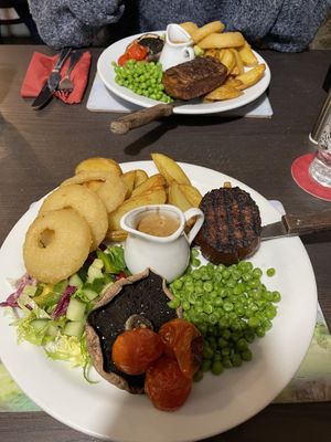 Two steak dinners, one filet and one flank  at The Queen Inn in Cwmbran