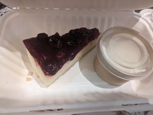 Gluten free and vegan gin and raspberry che*secake with cream (takeaway as too full to eat it there) at The Queen Inn in Cwmbran