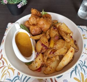 Ch*cken balls with salt and chilli chips and curry sauce at The Queen Inn in Cwmbran
