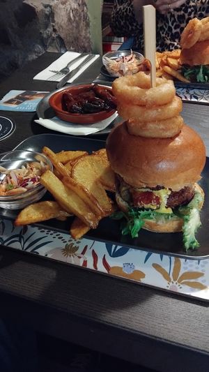 Mega burger with amazing  rib small plate in background  at The Queen Inn in Cwmbran
