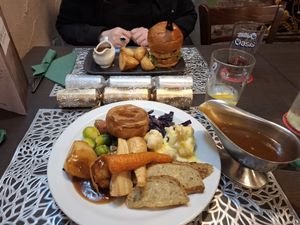 My more traditional dinner, with bubble and squeak burger in the background. Both excellent. at The Queen Inn in Cwmbran
