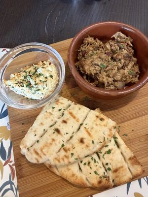 Spiced l*mb, hummus, and pita bread  at The Queen Inn in Cwmbran