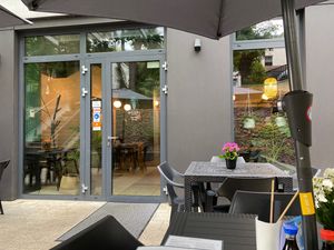 Entrance hidden in a corner at Enoki in Gdynia