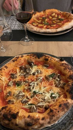 Red garlic marinara (top) and mushroom pizza with vegan cheese (bottom)  at Bella 'Mbriana in Sulmona