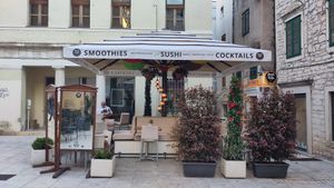 Outside comfy seating in pedestrian old town at Fresh and Hash in Sibenik