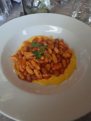 Gnocchetti sardi con pomodoro e crema di peperoni at L'M Ristopizza in San Pantaleo