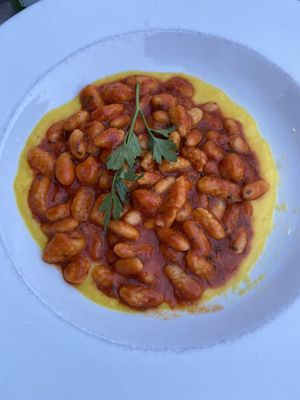 Gnocchi (with white beans in a tomato sauce and a yellow pepper cream)  at L'M Ristopizza in San Pantaleo