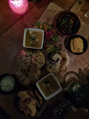Vegan shared platter. Maissoup, flamkuchen, pumpkin hummus, vegan steak tartar, bread and vegan aioli. at The Old Pal in Zoetermeer