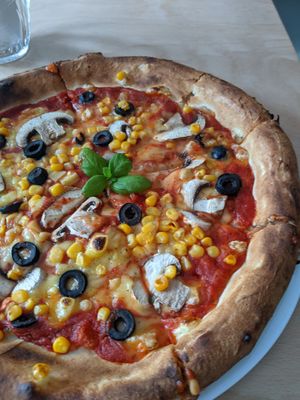 Homemade pizza with vegan cheese 😋🧀 at Coffee City in Plzen