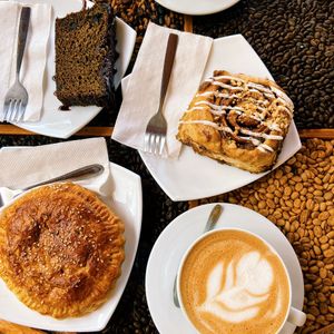 Baked goods with vegan latte (oat milk)  at Café Monteverde Coffee Shop in Monteverde