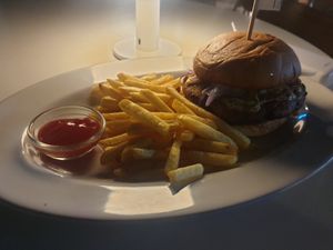 Burger and fries 7/10 fries are lacking they just felt like frozen oven chips slightly with the ketchup being ehh at Liim - 림 in Incheon