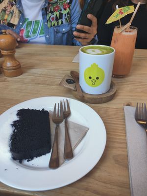 Chocolate cake and matcha latte at Billy Brunch & Garden in Barcelona