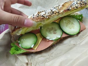 Baguette, trae semillas de girasol, ajonjolí y algunos otros granos. at Miga Vegana in Mexico City