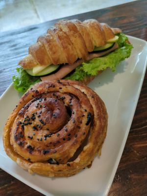 Pizza roll and sandwich de jamon at Miga Vegana in Mexico City
