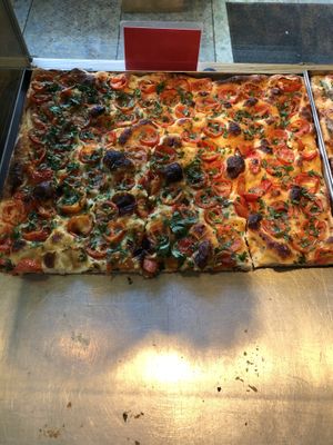 vegan roman style pizza by the slice at Va Bene in Warsaw