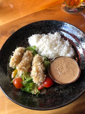 "Green tofu" - fried tofu coated in pandan rice flakes, salad, sesame dressing at Homy Fusion in Plzen