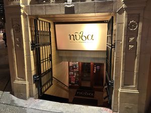 The entrance is on the very corner and downstairs!   at Nuba - Gastown in Vancouver