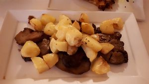 Scallopini with potatoes at Dolce Vegan in Florence