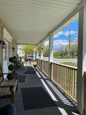 Porch seating at Grounds in New London