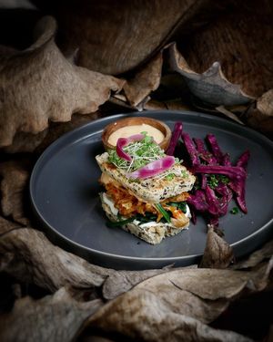 JACKFRUIT SANDWICH
Gluten free bread, sautéed jackfruit with chili jam, blanch baby spinach, purple potato fries, served with vegan sweet chili mayo at Pistachio in Ubud