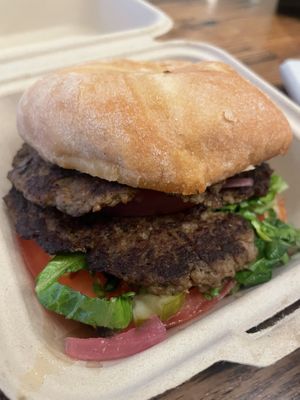 Shuk market burger  at Pressed Cafe in Boston