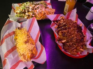 Supreme nachos, cheesr bacon hot dog and dirty chicken fries at Hank's  Dirty Colchester in Colchester