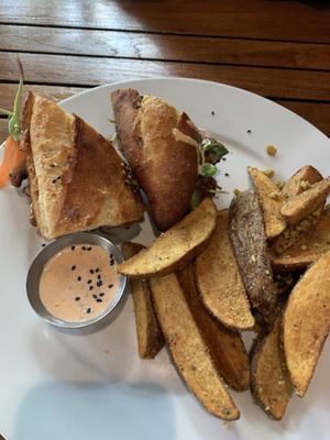 Bahn mi with parm fries   at The Haunt in Savannah