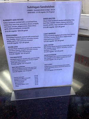 Updated menu inside restaurant  at SubVegan Sandwiches in Santa Ana