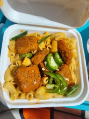 The Mac and cheese is okay but with the toppings it's great. at Project Pollo in Katy