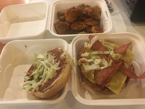 The deluxe and some fried pickles  at Project Pollo in Katy