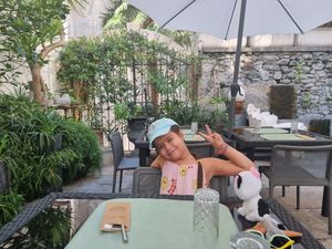 Happy kid at Caffè dell'Arte Boutique Rooms in Locarno