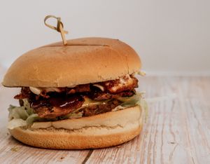 Barbie New Kid
Homemade Meatless Patty, homemade BBQ Sauce, Mayo, Lettuce, Onion Ring & This isnt Bacon! at The Vegan Kitchen in Birmingham