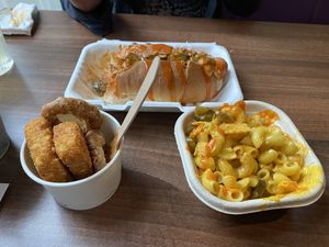 Amazon spicy Mac and cheese, perfect hotdog, crispy raptors and oignon rings   at The Vegan Kitchen in Birmingham