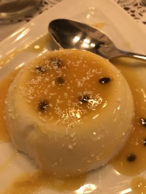 Vegan panna cotta  with passion fruit and mango  at Mãos de Horta in Castelo Branco