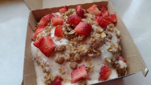 Amaretto frosting, strawberries & pie crumbles at Cinnaholic in Evanston