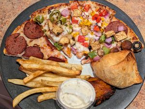 Delivery, All Vegan: Pepperoni Slice, Manchurian Slice, BBQ Slice, Combo Slice, Fries, Samosa, Buffalo Wing with Ranch at Pizza Twist in Boise