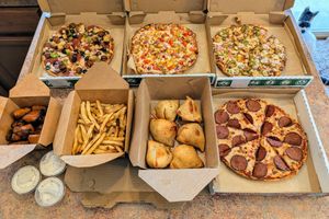 All Vegan: Combo Pizza, BBQ Pizza (+sweet corn), Manchurian Pizza (spicy), Pepperoni Pizza, Samosas, Fries, Buffalo Wings with Ranch at Pizza Twist in Boise