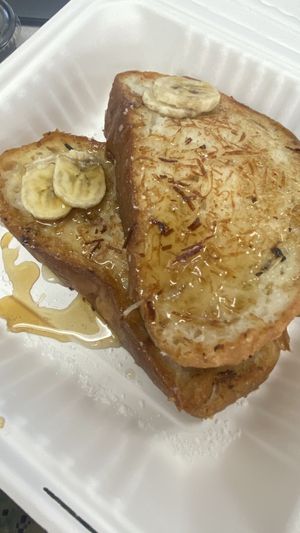 Vegan Coconut French Toast w/ added bananas 🤤 at Naked Cafe in Carlsbad