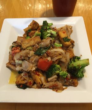 Number 54 - Pad Kee Mao with Tofu. The wide rice noodles are different but good. Overall very tasty. at King and I Thai in Mendota Heights