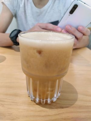 Oolong tea with mango bits and passionfruit. Tea was unsweetened otherwise.👍🏻 at Lilac Oak in Central Singapore