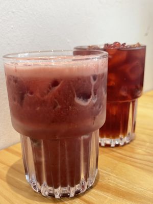 Refreshing drinks w strawberry pearls  at Lilac Oak in Central Singapore