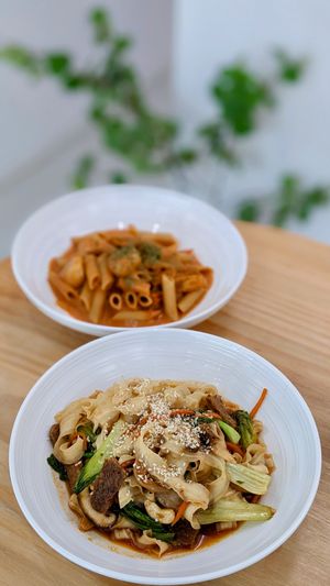 Vegan Mushroom Knife Cut Noodles Stir-Fry, Gochujang Rosé Penne at Lilac Oak in Central Singapore